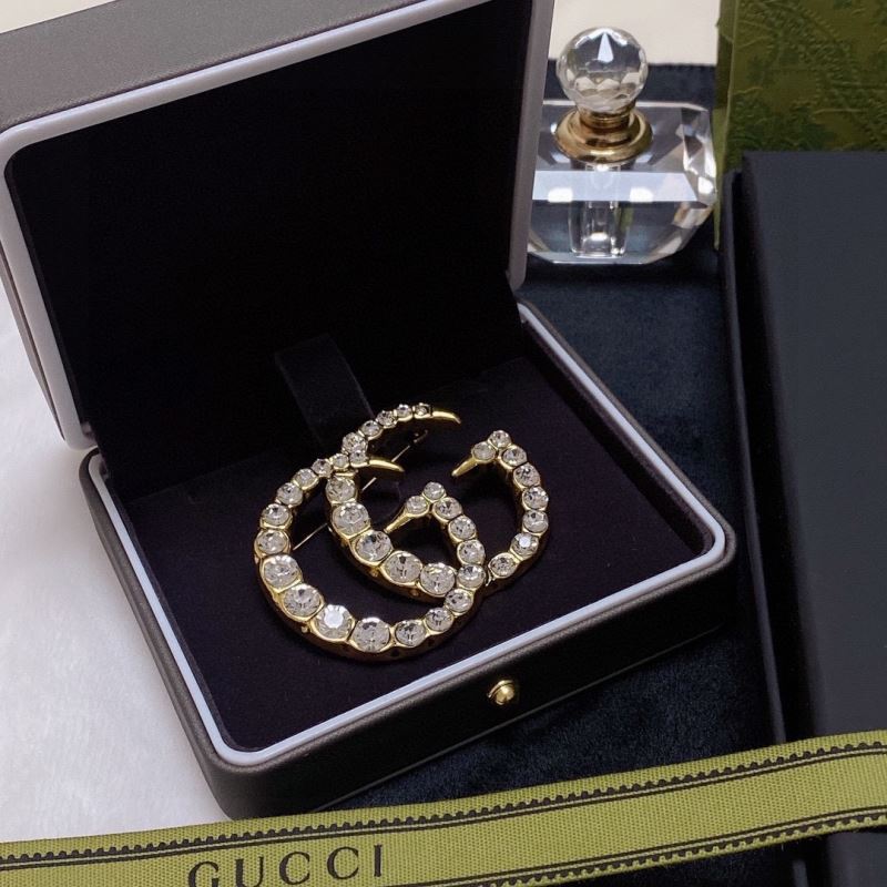 Gvc*1 brooches